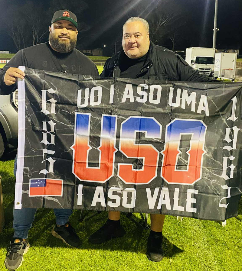 Thane with Hawaiian BBQ Owner holding Uso Aso Uma Flag